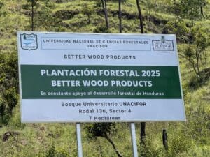 Sign for the Better Wood Products 2025 forest plantation at UNACIFOR