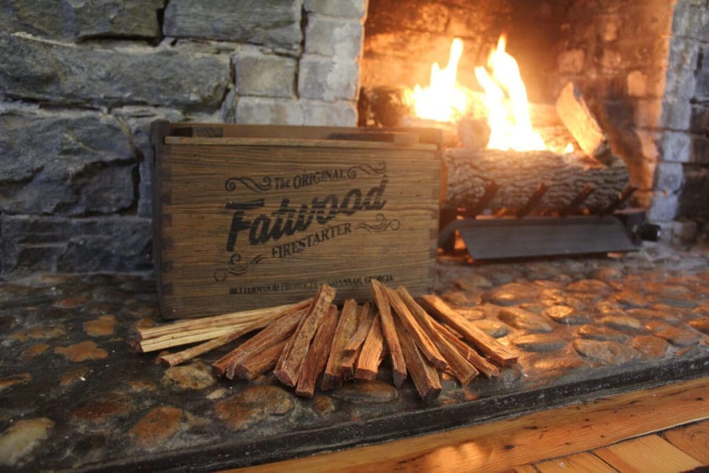 fatwood in wooden box by fireplace